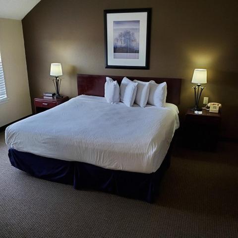 Sterling Hotel And Suites Clive Esterno foto