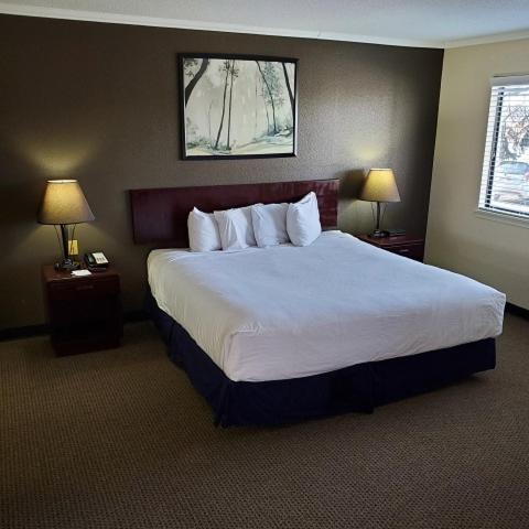 Sterling Hotel And Suites Clive Esterno foto